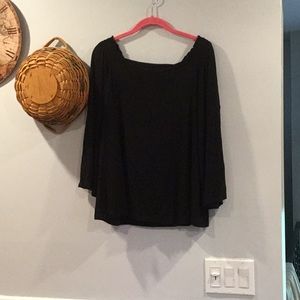 Iman off the shoulder top